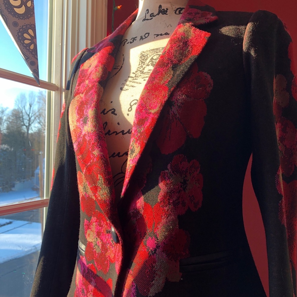 Yoana Baraschi Brown blazer with gorgeous red floral pattern.